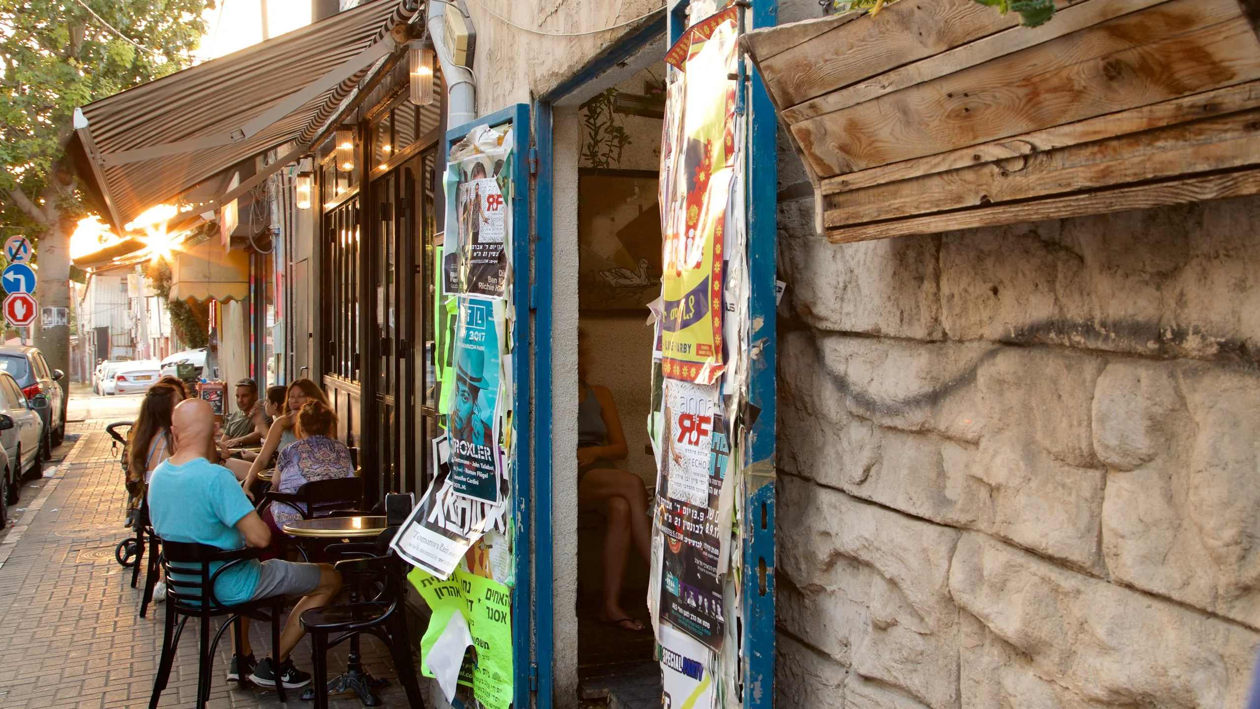 Illustrative colorful street art wall with TLV letters