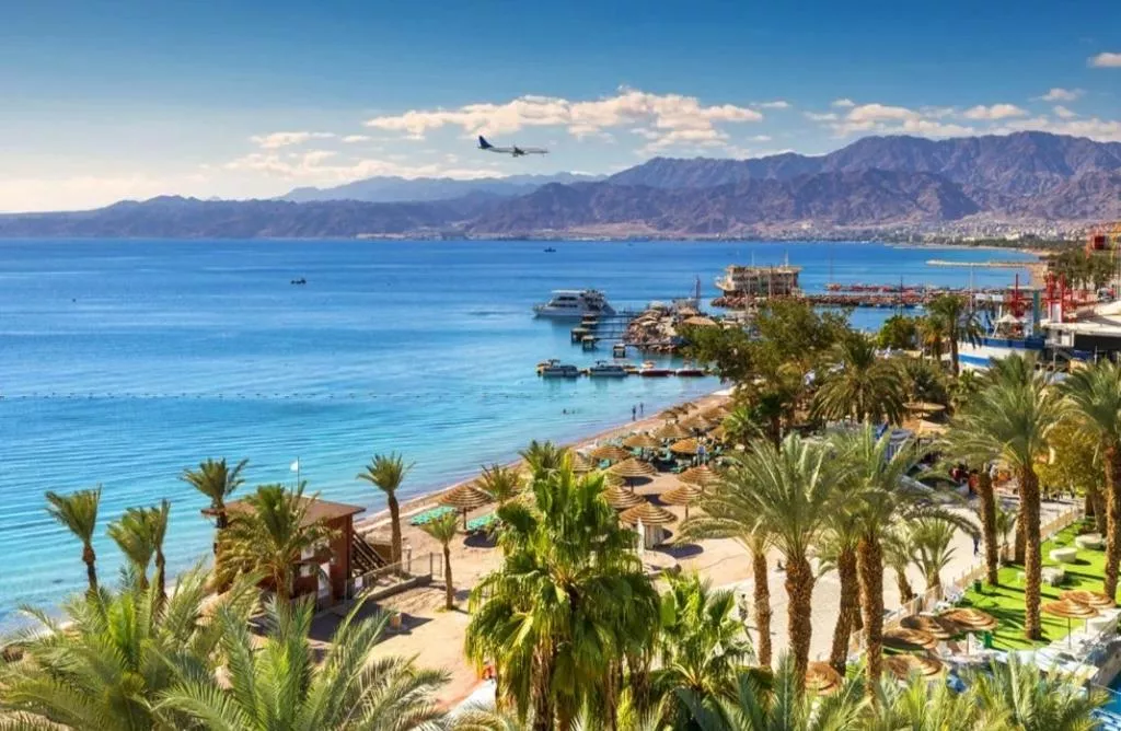 Simple orientation map sketch showing Princess Beach, Migdalor/Lighthouse, Mosh’s, Dekel, and the city promenade area